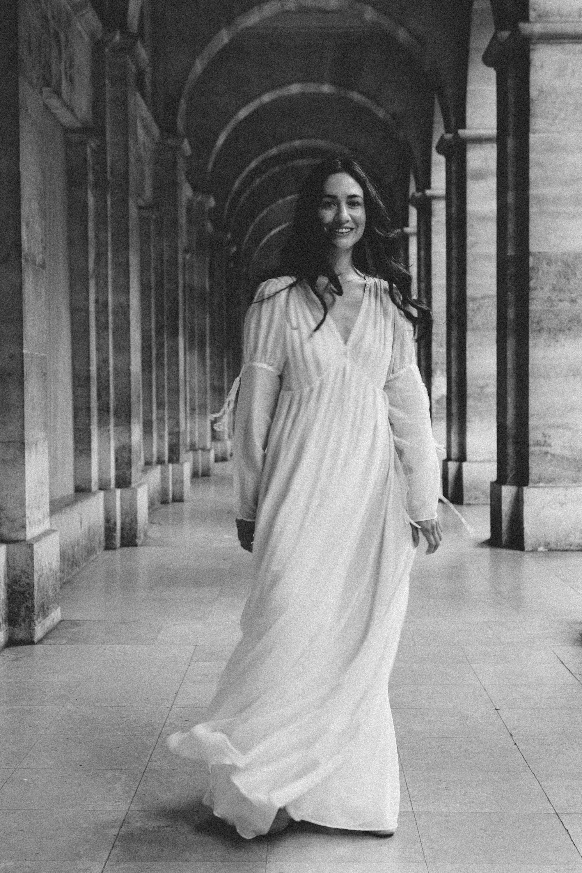 Film noir monochrome portrait of a woman in Paris, evocative black and white photography by Carla Coulson