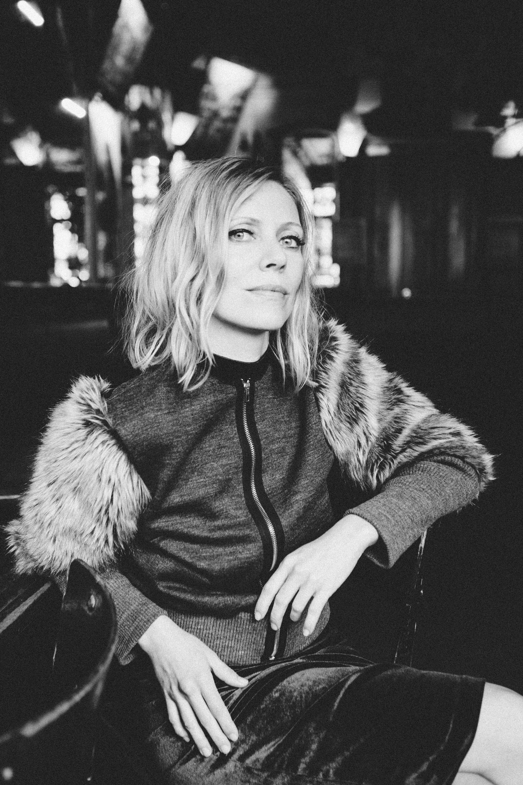 Film noir black and white portrait of a woman in a Parisian interior, moody photography by Carla Coulson
