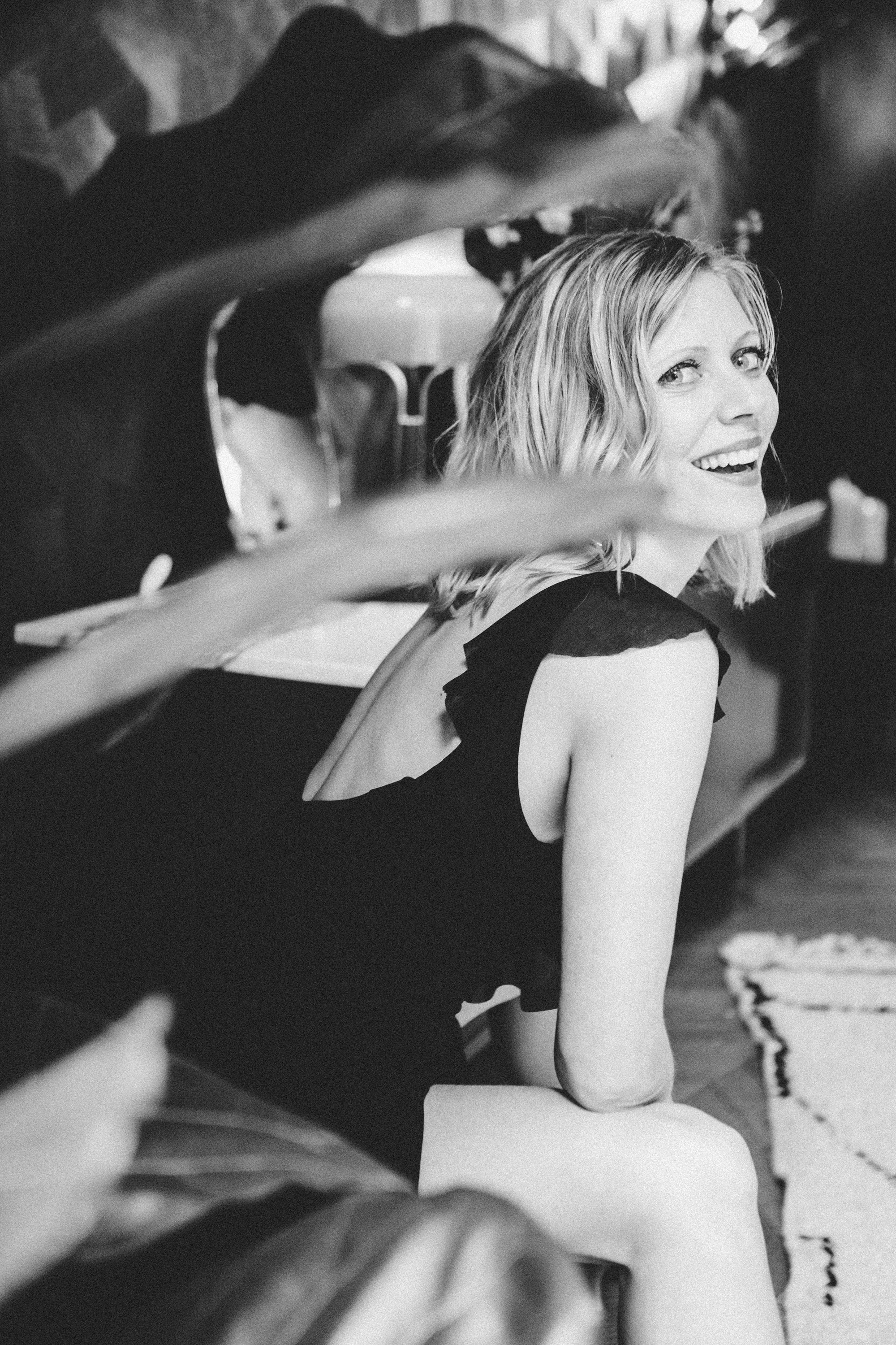 Evocative monochrome film noir portrait of a woman in Paris, photography by Carla Coulson