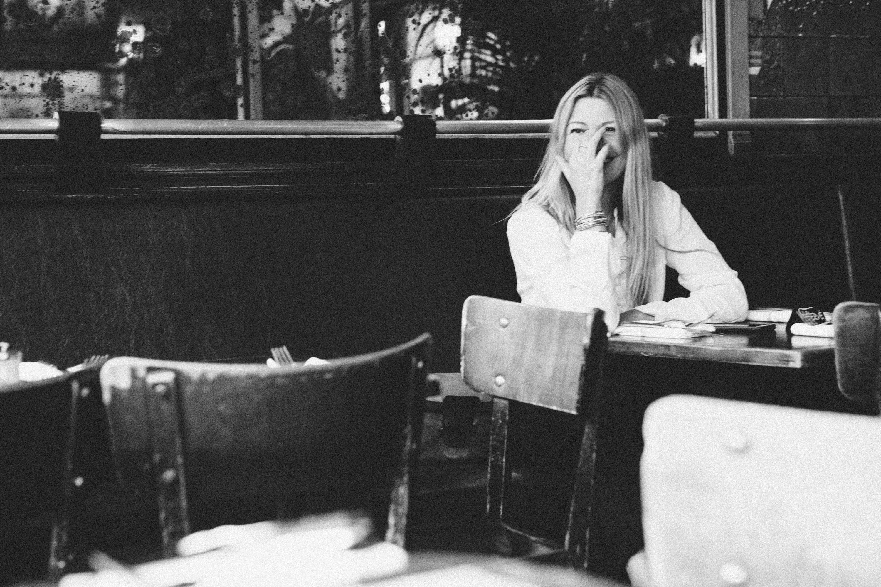 Dramatic wide-format film noir portrait of a woman in Paris, monochrome photography by Carla Coulson