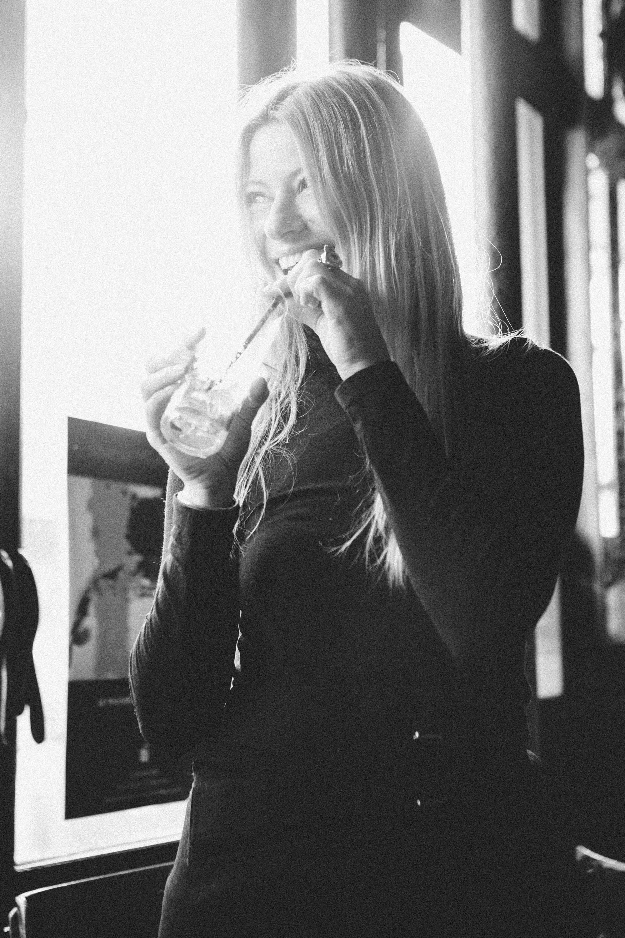 Evocative film noir portrait of a woman in Paris, atmospheric black and white photography by Carla Coulson