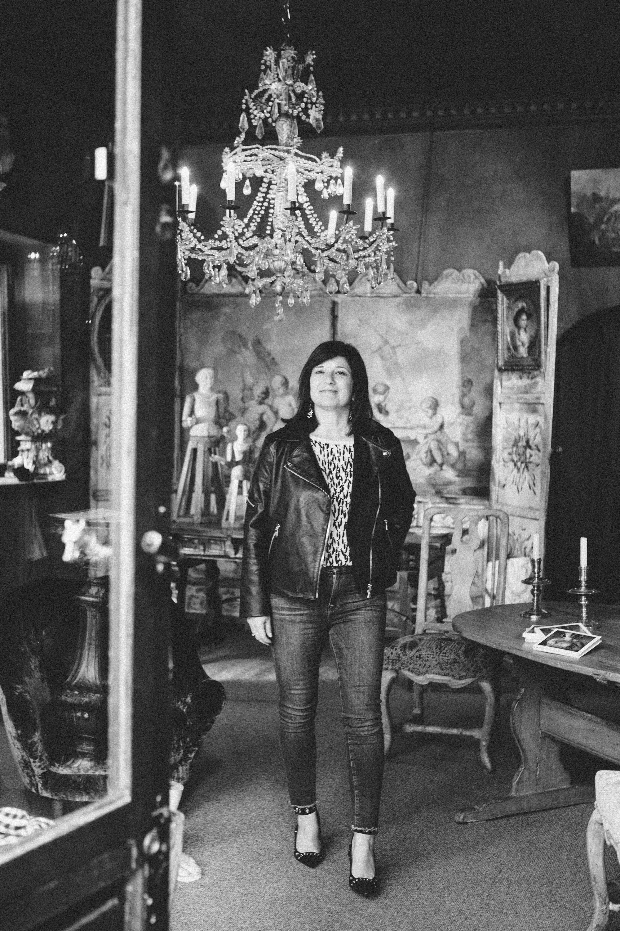 Atmospheric black and white film noir portrait of a woman in Paris, photography by Carla Coulson