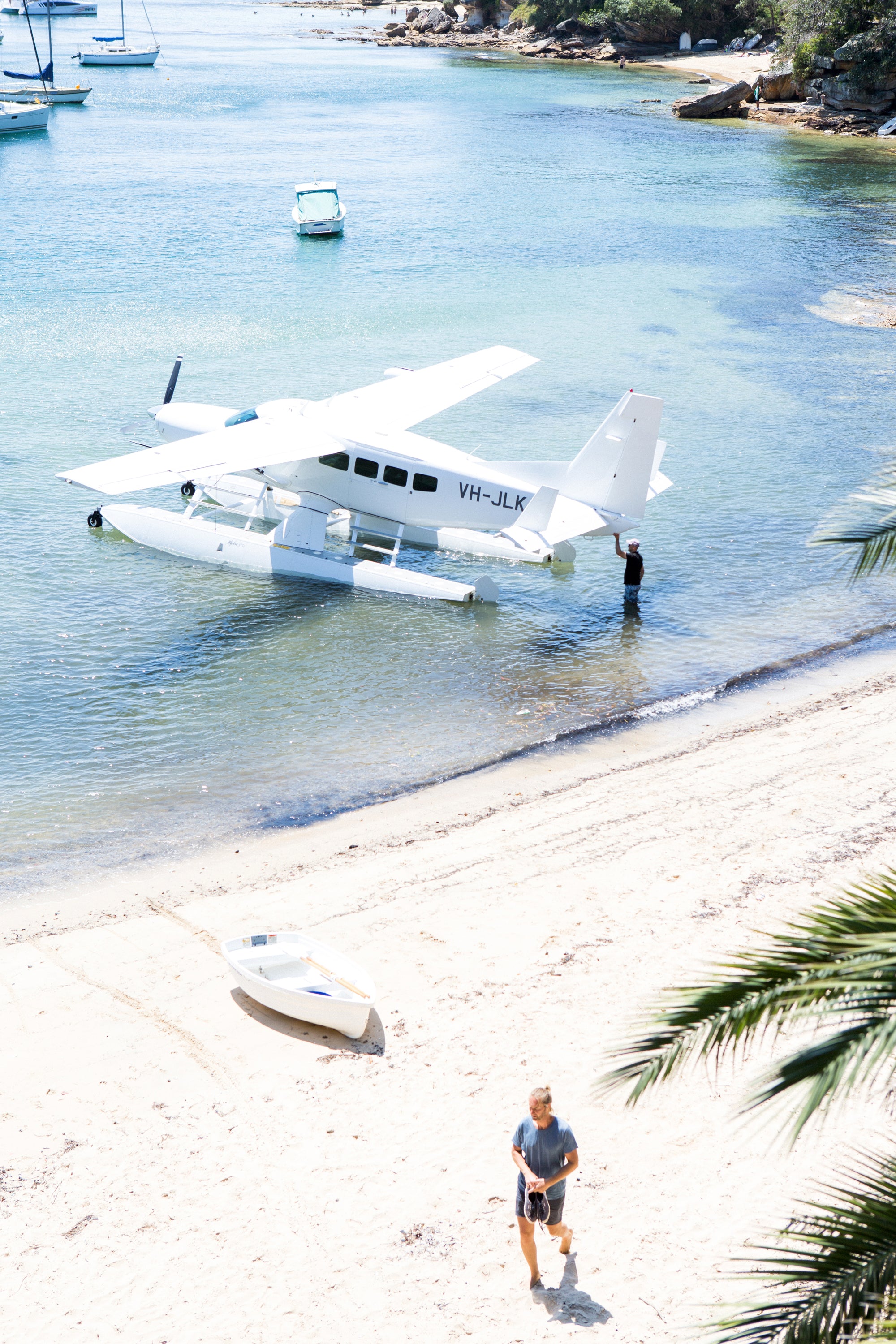 Seaplane on water in luxury beach property — luxury photography Carla Coulson