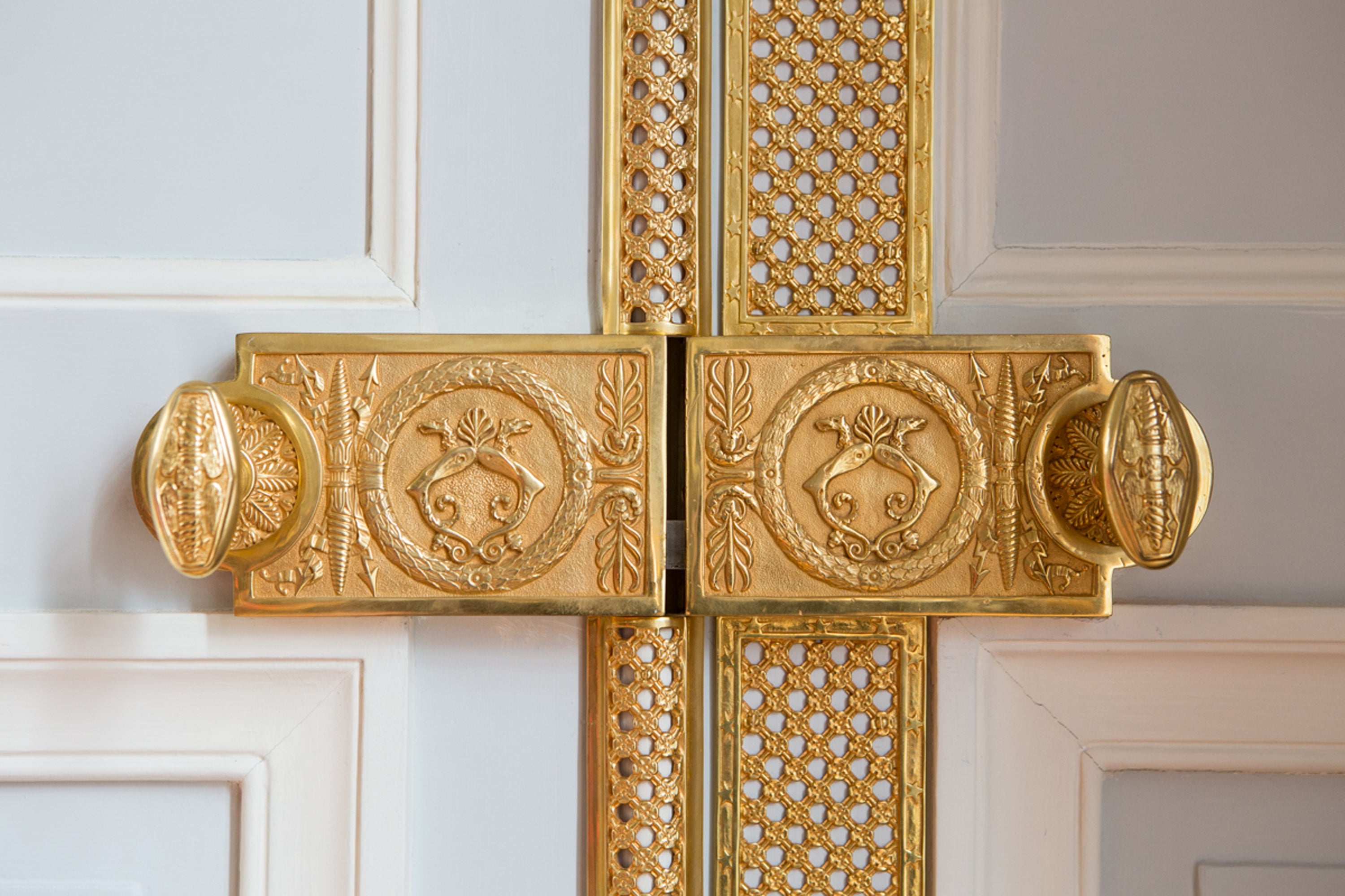 Luxury hotel interior details, ornate door — editorial photography by Carla Coulson