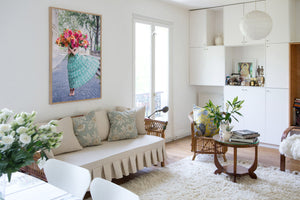 New Beginnings is a photo of a girl on the Ile St Louis in Paris with a big bunch of bright, joyous dahlias and is part of a limited edition series named Young Girl in Bloom by photographer Carla Coulson celebrating women loving and believing in themselves and building their self esteem by trusting their intuition.