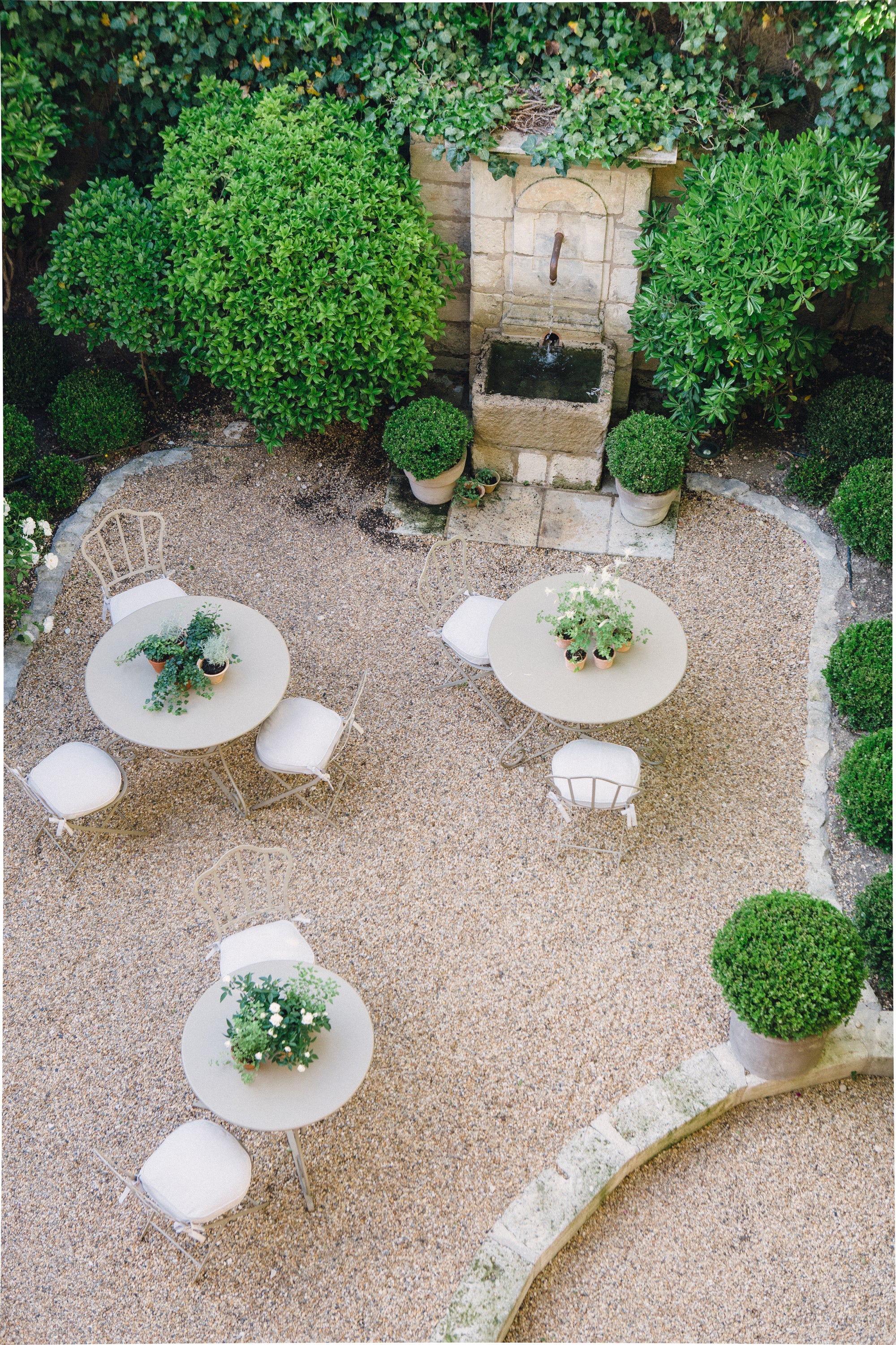 Elegantly styled hotel garden table setting — lifestyle and hospitality photography by Carla Coulson