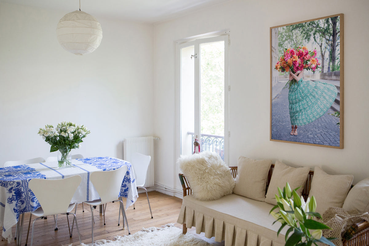 New Beginnings is a photo of a girl on the Ile St Louis in Paris with a big bunch of bright, joyous dahlias and is part of a limited edition series named Young Girl in Bloom by photographer Carla Coulson celebrating women loving and believing in themselves and building their self esteem by trusting their intuition.