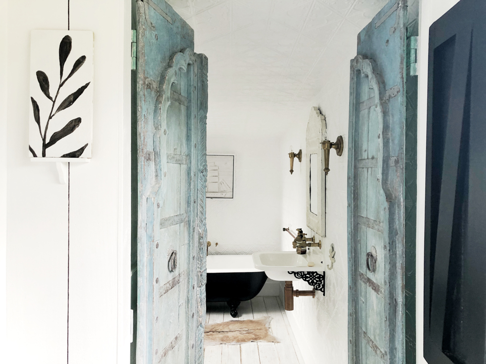 beautiful bathroom by Claire Lloyd and Matthew usmar Lauder at their Airbnb Strahan Tasmania